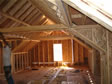 Open view of a 3rd floor attic area as the modular home is constructed day of set